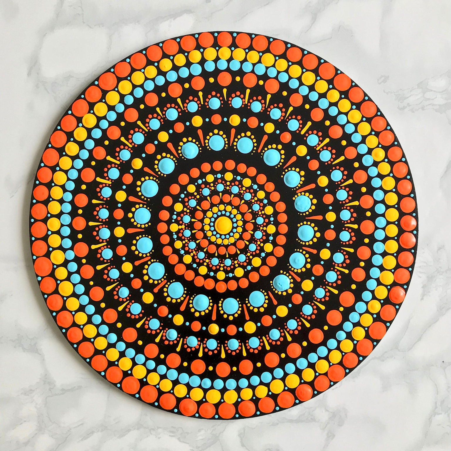 Dot mandala on black background